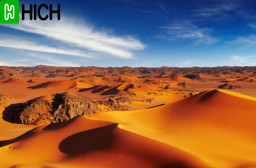 HICH:How do the dynamics of sand dunes in deserts influence their surrounding environments?