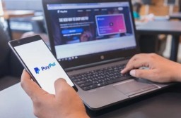 HICH:What could be a possible reason for difficulty withdrawing money from a PayPal account?