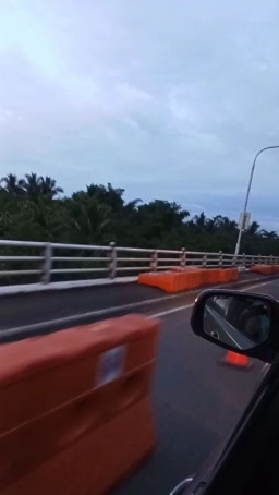 HICH:Passing by at San Juanico Bridge, also known as the 
