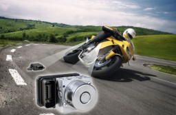 HICH:How does the Anti-lock Braking System (ABS) in modern motorcycles enhance safety during braking?