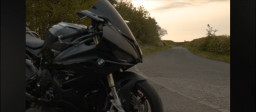 HICH:Why are BMW motorcycles famous for providing a premium riding experience?